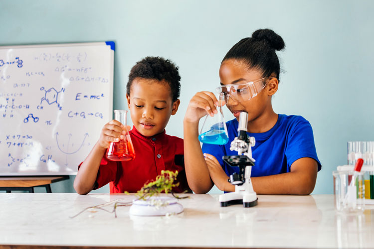 young students doing a science experiment